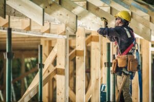 Contractor framing a house.