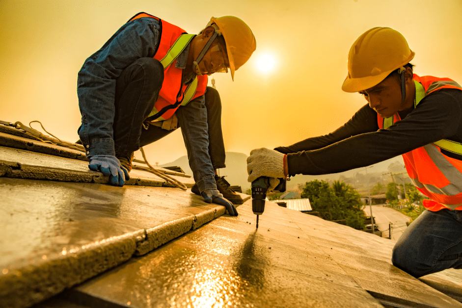 Roofing contractors installing a roof.